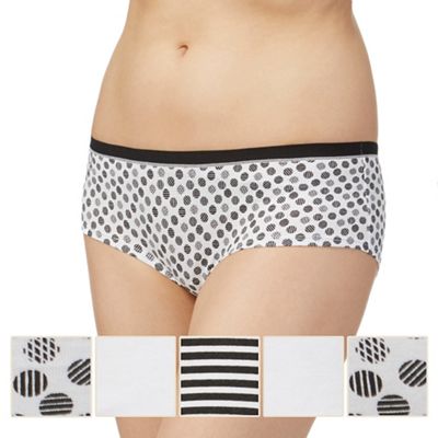Pack of five white and black plain and printed shorts